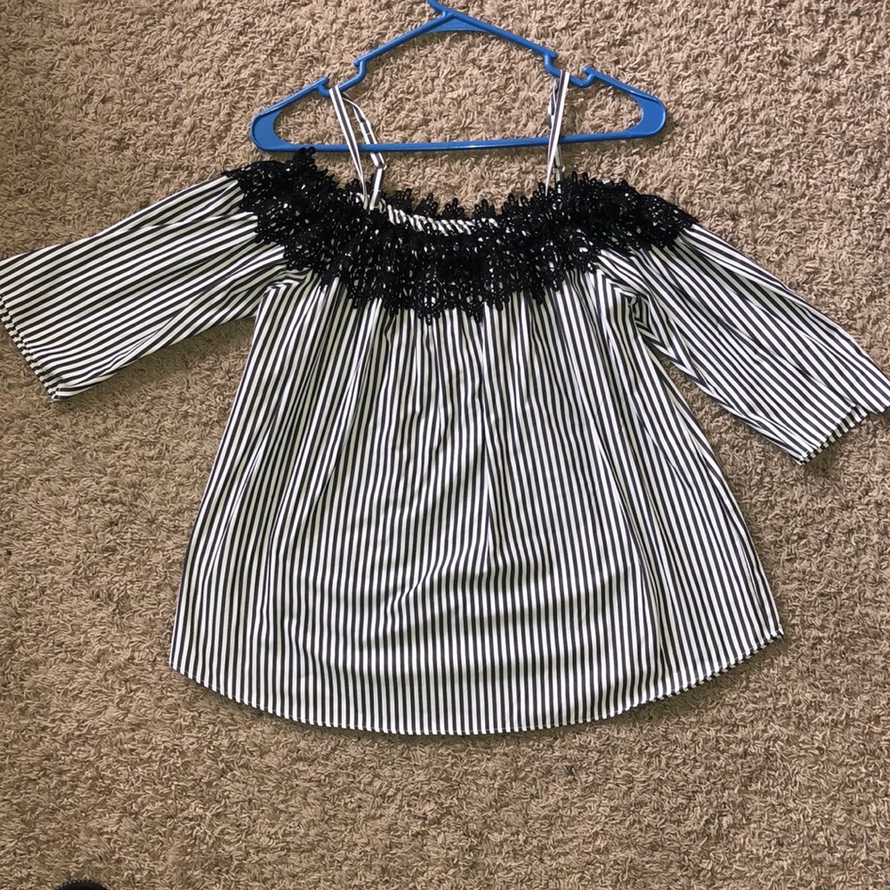 Off the shoulder top with lace detail.